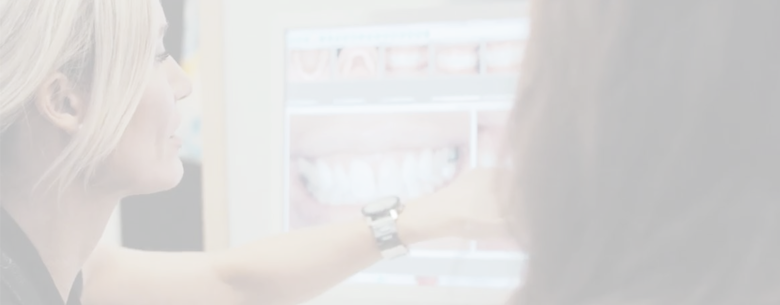 Patient discussing dental implants